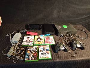 lot 434 image: Xbox with games and controllers, Wii,  hand held Wii, wireless Wii controller and all the connections