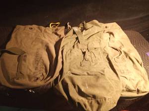 lot 142 image: 3 US military duffle bags - 2 with military names on them
