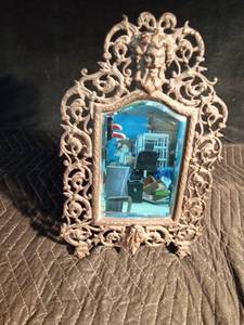 lot 113 image: Cast iron framed beveled mirror