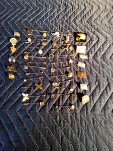 lot 157 image: 27 decorative stick pins and 13 pins