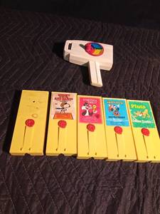 lot 104 image: Fisher Price movie viewer with 5 movies