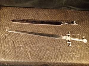 lot 69 image: 35 long sword with engraving on blade with leather sheath