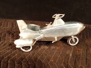 lot 62 image: Xonex atomic missile die cast plane replica