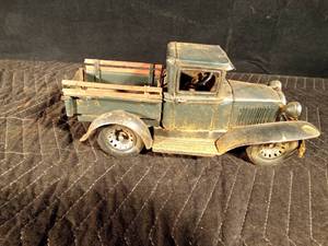 lot 49 image: Vintage tin model A pick-up truck