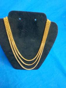 lot 179 image: 3 Gold Tone Necklaces