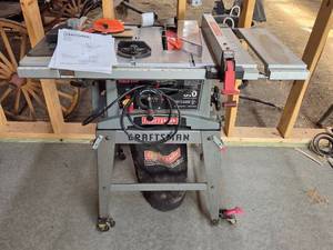 lot 37 image: Craftsman 10-Inch Table Saw with Stand and Accessories