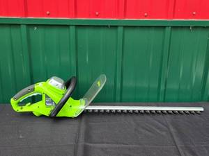 lot 38 image: Greenworks 22-Inch Electric Hedge Trimmer Model 2200102