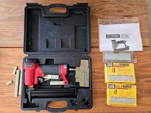 lot 55 image: Tool Shop 18 Gauge Brad Nailer Kit with Staples and Carrying Case