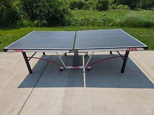 lot 57 image: Stiga Outdoor Table Tennis Table with Foldable Design and Ball Holder