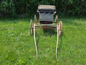 lot 75 image: Antique Horse-Drawn Buggy with Wooden Wheels