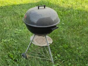 lot 94 image: Used Charcoal Grill with Wheels and Removable Lid