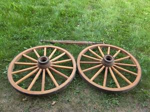 lot 95 image: Antique Wooden Wagon Wheels and Axle Set