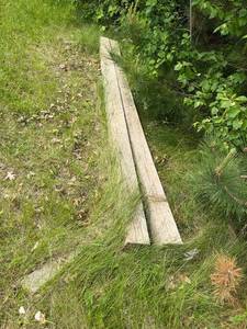 lot 103 image: Weathered Wooden Beams for Outdoor Projects
