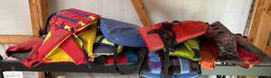lot 144 image: Collection of Adult and Youth Life Vests, Various Sizes and Colors