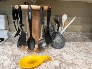 lot 175 image: Spinning Kitchen Utensil Holder with Assorted Utensils and Ceramic Jug