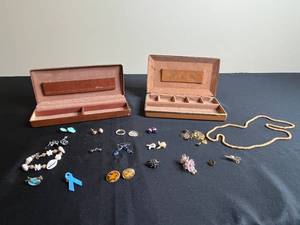 lot 202 image: Assorted Vintage Jewelry Collection with Earrings, Pins, and Brooches