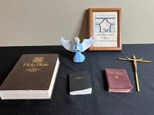lot 216 image: Religious Collection Bibles, Angel Figurine, Cross, and Framed Embroidery
