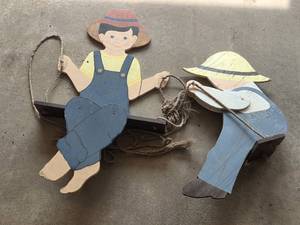 lot 261 image: Pair of Handcrafted Wooden Farmer Child Shelf Decor