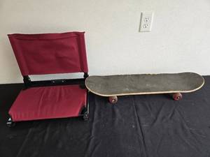 lot 309 image: Used Skateboard and Folding Stadium Seat