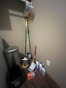 lot 359 image: Cleaning Supplies Bundle with Stainless Trash Can, Brooms, Mops, and Detergents - contents quantities unverified