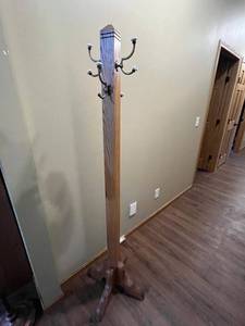 lot 404 image: Oak Wooden Coat Rack with Brass Tone Hooks and Porcelain Finials