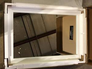 lot 17 image: 32 in. H x 22 in. W White Modern Rectangular Framed Vanity Mirror Customer Returns See Pictures
