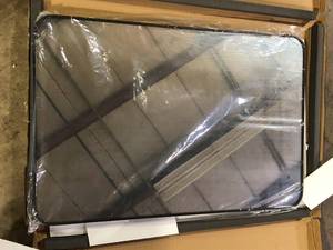 lot 18 image: XRAMFY 24 in. W x 36 in. H Rectangular Aluminum Alloy Framed Rounded Black Wall Mirror  Customer Returns See Pictures