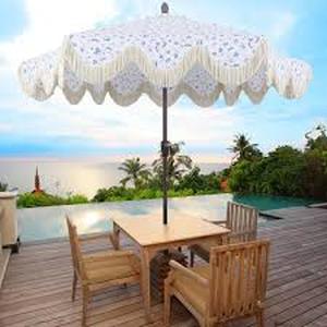 lot 35 image: JONATHAN Y Collins 9 ft. Cottage Tassel Market Patio Umbrella with Auto-Tilt, Crank, Wind Vent and UV Protection in WhiteCream  Customer Returns See Pictures