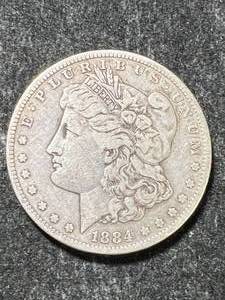 lot 07 image: 1884-S US MORGAN SILVER DOLLAR