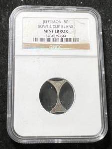 lot 14 image: US JEFFERSON NICKEL BOWTIE CLIP BLANK NGC MINT ERROR