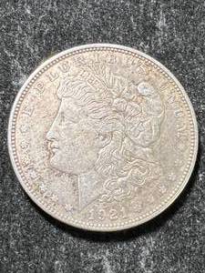 lot 16 image: 1921-D US MORGAN SILVER DOLLAR
