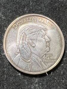 lot 28 image: 1 TROY OZ .999 FINE SILVER DONALD TRUMP ROUND