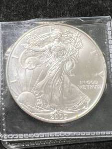 lot 30 image: 2005 AMERICAN SILVER EAGLE 1 TROY OZ .999 FINE SILVER