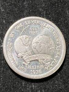 lot 56 image: 1 TROY OZ .999 FINE SILVER TRADE UNIT ROUND