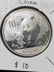 lot 90 image: 2012 CHINESE PANDA 1 TROY OZ .999 FINE SILVER