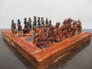 lot 27 image: Vintage Hand Carved African Wood Chess Set