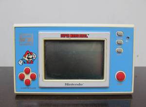 lot 62 image: Nice Condition Vintage NINTENDO Game & Watch Handheld Video Game - Super Mario Bros