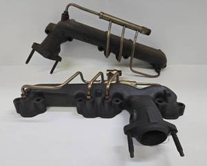 lot 364 image: New or Like New GM Exhaust Manifolds