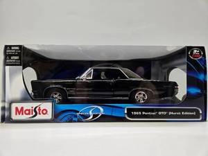 lot 308 image: Mint in Box Diecast Metal 1965 Pontiac GTO (Hurst Edition)