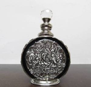lot 254 image: Art Deco Style Floral Designs Metal Overlay On Perfume Bottle