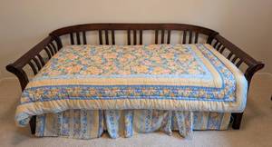 lot 24 image: Mahogany Daybed and Colorful Comforter Set