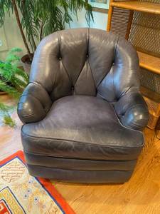 lot 14 image: Navy Leather Swivel Rocker
