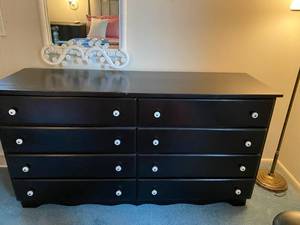 lot 25 image: Black Dresser with White Knobs