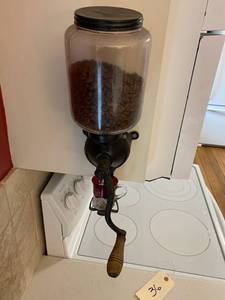 lot 36 image: Coffee Bean Grinder, Arcade Glass Jar, and 1929 State Fair Glass