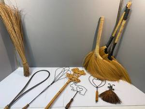 lot 101 image: Vintage Rug Beaters and Straw Brooms