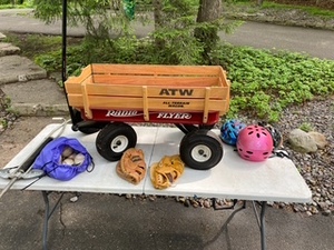 lot 210 image: Outdoor Toys - Radio Flyer WagonPogo StickHelmetsBaseball Gloves and Balls