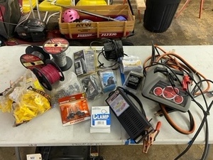 lot 227 image: Battery Chargers  Trailer Bearing Repair Kit  Clamps  Adapter Connector  Wire  Wood Post Insulators