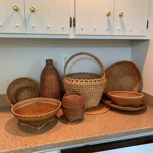 lot 178 image: Treasure trove of Nine unique handmade baskets collected from various sources