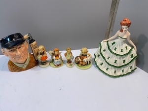 lot 263 image: Hummels Royal Dalton Golfer Victorian Lady and More