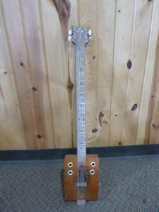 lot 21 image: Homemade Cigar Box Guitar